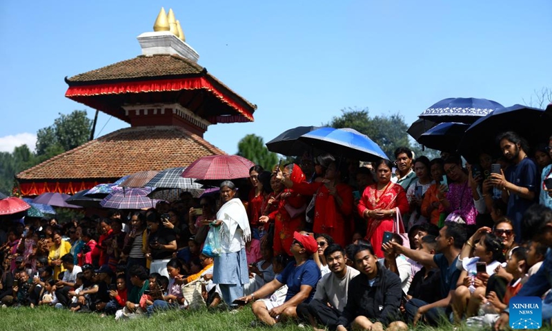 People attend an event in celebration of the Sikali Jatra festival in Lalitpur, Nepal, Sept. 27, 2025. The festival, also called the festival of Rudrayani, is celebrated here on Saturday. (Photo: Xinhua)