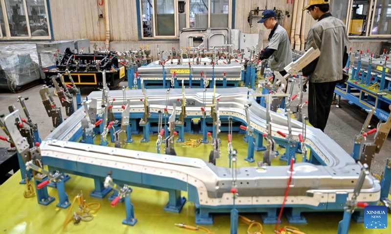 Technicians check product quality at a mold company in Botou, north China's Hebei Province, Sept. 24, 2025. (Photo: Xinhua)