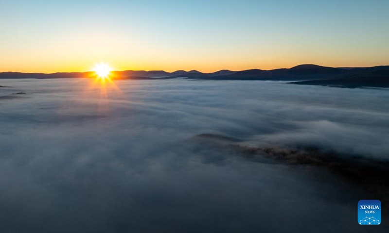 An aerial drone photo taken on Sept. 29, 2025 shows a sunrise view of the Arxan National Forest Park in Arxan of Hinggan League, north China's Inner Mongolia Autonomous Region. Photo: Xinhua
