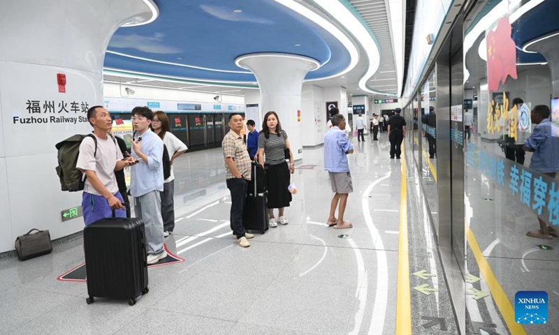 Passengers wait for the train at a station of Fuzhou Metro Binhai Express in Fuzhou, southeast China's Fujian Province, Sept. 29, 2025. With a length of about 62.4 kilometers, Fuzhou Metro Binhai Express became operational on Monday. Photo: Xinhua