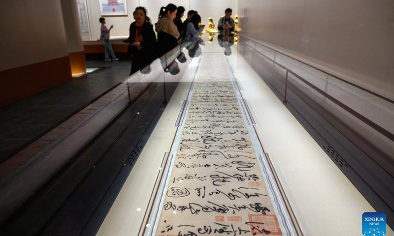 Invited visitors view the Gold Chalice of Eternal Stability exhibited at the Palace Museum in Beijing, capital of China, Sept. 29, 2025. at the Palace Museum in Beijing, capital of China, Sept. 29, 2025. Photo: Xinhua
