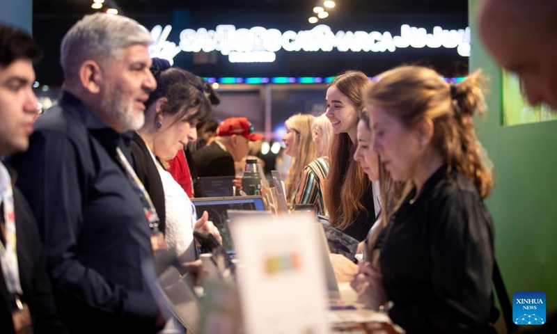 Visitors learn about information at a stand during the 29th International Tourism Fair of Latin America (FIT) 2025 at La Rural fairgrounds in Buenos Aires, Argentina, on Sept. 29, 2025. Photo: Xinhua