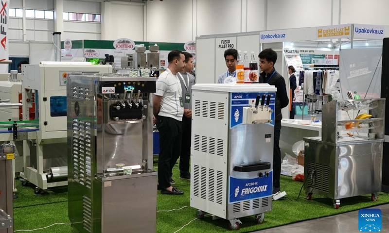People visit an international exhibition of food, packaging, processing technologies and HoReCa (hotel, restaurant and cafe) industry in Tashkent, the capital of Uzbekistan, on Oct. 4, 2025. The exhibition, held here on Oct. 2-4, brought together companies from various sectors, including food, ingredients and spices, packaging equipment, hygiene and safety, and storage and logistics, aiming to promote technological exchange within the industry and drive the development of the sector in Uzbekistan. (Photo by Zafar Khalilov/Xinhua)