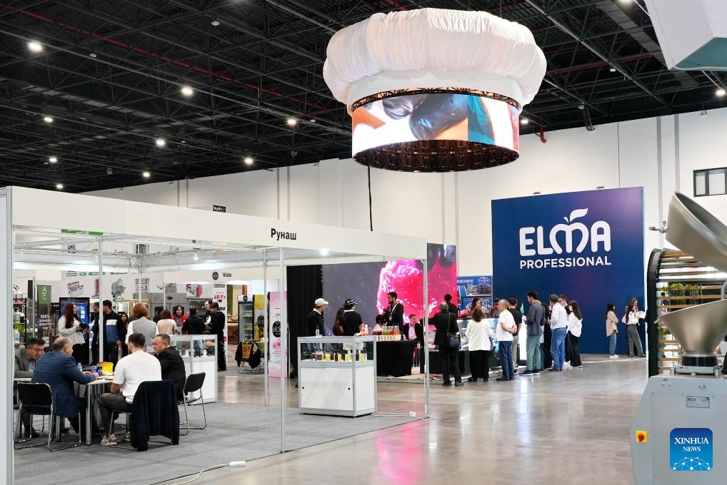 This photo taken on Oct. 4, 2025 shows a scene at an international exhibition of food, packaging, processing technologies and HoReCa (hotel, restaurant and cafe) industry in Tashkent, the capital of Uzbekistan. The exhibition, held here on Oct. 2-4, brought together companies from various sectors, including food, ingredients and spices, packaging equipment, hygiene and safety, and storage and logistics, aiming to promote technological exchange within the industry and drive the development of the sector in Uzbekistan. (Photo by Zafar Khalilov/Xinhua)