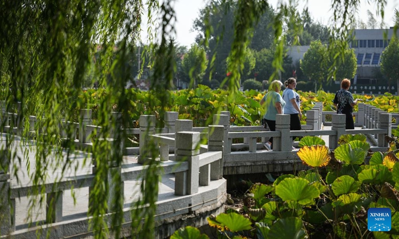 Russian patients walk inside a rehabilitation hospital after completing their treatment in Anshan, northeast China's Liaoning Province, Sept. 30, 2025.