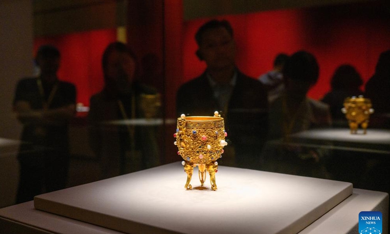 Invited visitors view the Gold Chalice of Eternal Stability exhibited at the Palace Museum in Beijing, capital of China, Sept. 29, 2025. at the Palace Museum in Beijing, capital of China, Sept. 29, 2025. Photo: Xinhua