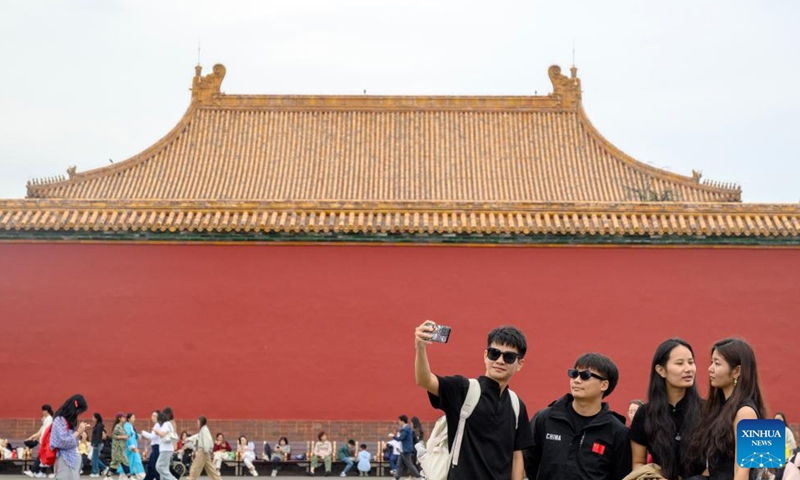 Tourists visit the Palace Museum in Beijing, capital of China, Oct. 3, 2025. This year marks the 100th anniversary of the founding of China's Palace Museum, also known as the Forbidden City.(Xinhua/Jin Liangkuai)