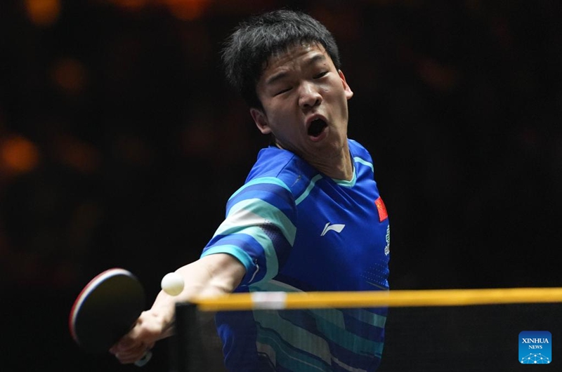Xiang Peng of China hits a return during the men's singles semifinal match between Wang Chuqin of China and Xiang Peng of China at 2025 World Table Tennis (WTT) China Smash in Beijing, China, Oct. 5, 2025. (Xinhua/Xie Han)