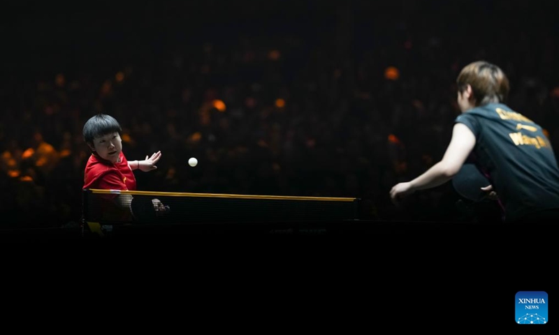 Sun Yingsha (L) hits a return during the women's singles final match between Sun Yingsha of China and Wang Manyu of China at 2025 World Table Tennis (WTT) China Smash in Beijing, China, Oct. 5, 2025. (Xinhua/Sun Fei)