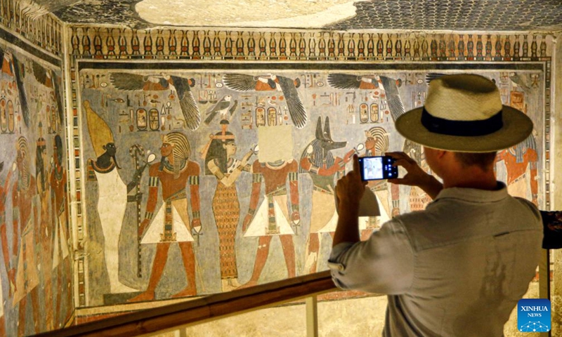 A tourist takes photos while visiting the tomb of New Kingdom Pharaoh Amenhotep III in the Valley of the Kings on the West Bank of Luxor, Egypt, on Oct. 4, 2025. Egypt's Ministry of Tourism and Antiquities on Saturday opened the tomb of New Kingdom Pharaoh Amenhotep III in the Valley of the Kings to visitors, following more than two decades of restoration.

The tomb, belonging to Amenhotep III who ruled Egypt more than 3,500 years ago, is situated on the western side of the famed necropolis. Egyptian antiquities authorities said it was first discovered in 1799 and subsequently looted, including the sarcophagus. Photo: Xinhua