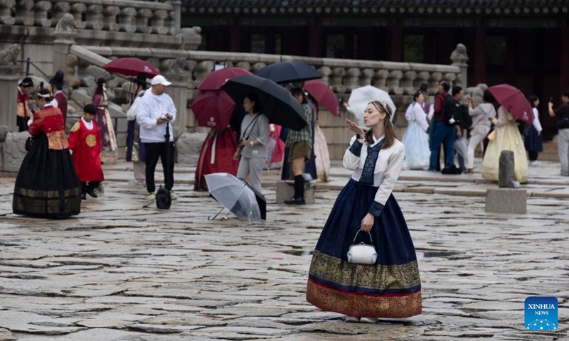People visit the Gyeongbokgung Palace in Seoul, South Korea, Oct. 5, 2025. Ancient palaces in Seoul including the Gyeongbokgung Palace are open to the public free of charge from Oct. 3 to 9. (Photo by Jun Hyosang/Xinhua)
