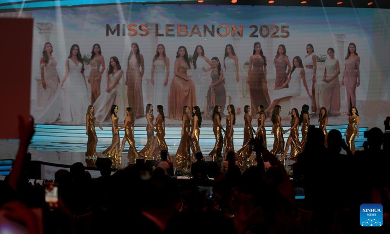 Contestants are seen on the stage in the Miss Lebanon 2025 contest in Beirut, Lebanon, on Oct. 4, 2025. Miss Lebanon is Lebanon's national beauty pageant. This year, Lebanon crowned 22-year-old Perla Harb as its beauty queen for the year 2025 during a ceremony held on Saturday evening. (Photo by Bilal Jawich/Xinhua)