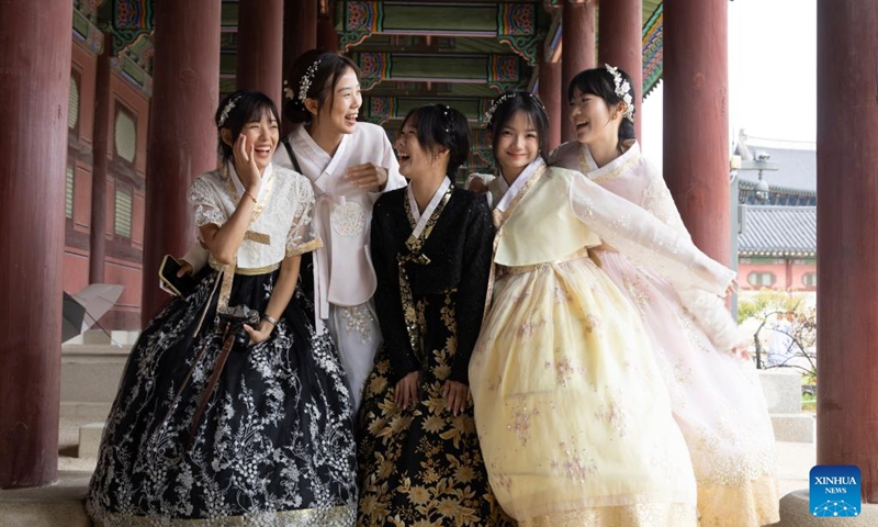 People in traditional Korean attire Hanbok visit the Gyeongbokgung Palace in Seoul, South Korea, Oct. 5, 2025. Ancient palaces in Seoul including the Gyeongbokgung Palace are open to the public free of charge from Oct. 3 to 9. (Photo by Jun Hyosang/Xinhua)