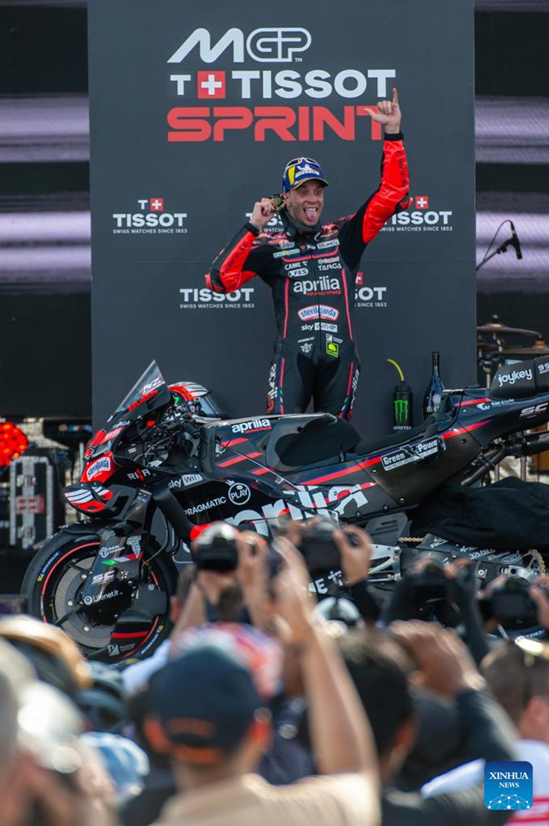 Gold medalist Italian rider Marco Bezzecchi (Top) of Aprilia Racing poses on the podium during the awarding ceremony of the Sprint Race of MotoGP at the Pertamina Grand Prix of Indonesia 2025 in Lombok Island, Indonesia on Oct. 4, 2025. Photo: Xinhua