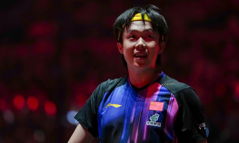 Wang Chuqin reacts after winning the men's singles final match, Oct. 5, 2025. (Xinhua/Sun Fei)