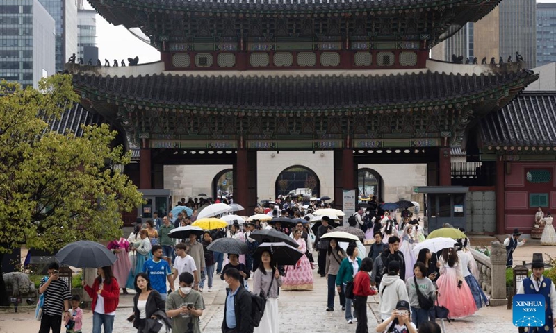 People visit the Gyeongbokgung Palace in Seoul, South Korea, Oct. 5, 2025. Ancient palaces in Seoul including the Gyeongbokgung Palace are open to the public free of charge from Oct. 3 to 9. (Photo by Jun Hyosang/Xinhua)