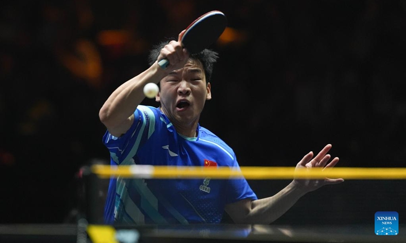 Xiang Peng of China hits a return during the men's singles semifinal match between Wang Chuqin of China and Xiang Peng of China at 2025 World Table Tennis (WTT) China Smash in Beijing, China, Oct. 5, 2025. (Xinhua/Xie Han)