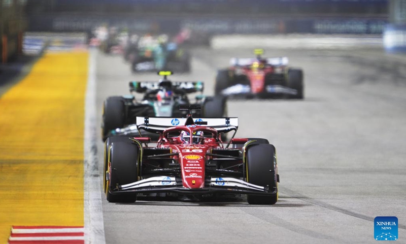 Ferrari's Monegasque driver Charles Leclerc (front) drives during the Formula 1 Singapore Grand Prix 2025 in Singapore, Oct. 5, 2025. (Photo by Then Chih Wey/Xinhua)