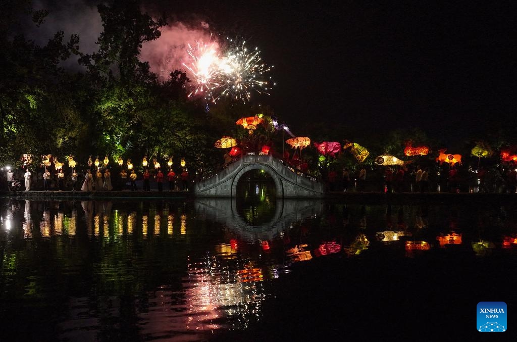 This aerial drone photo taken on Oct. 5, 2025 shows people taking part in a lantern parade at Hongcun Village of Yixian County, Huangshan City, east China's Anhui Province. Yixian County is noted for its lantern gala, an important folk event held during traditional festivals. (Photo by Shi Yalei/Xinhua)