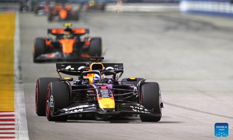 Red Bull's Dutch driver Max Verstappen (front) drives during the Formula 1 Singapore Grand Prix 2025 in Singapore, Oct. 5, 2025. (Photo by Then Chih Wey/Xinhua)