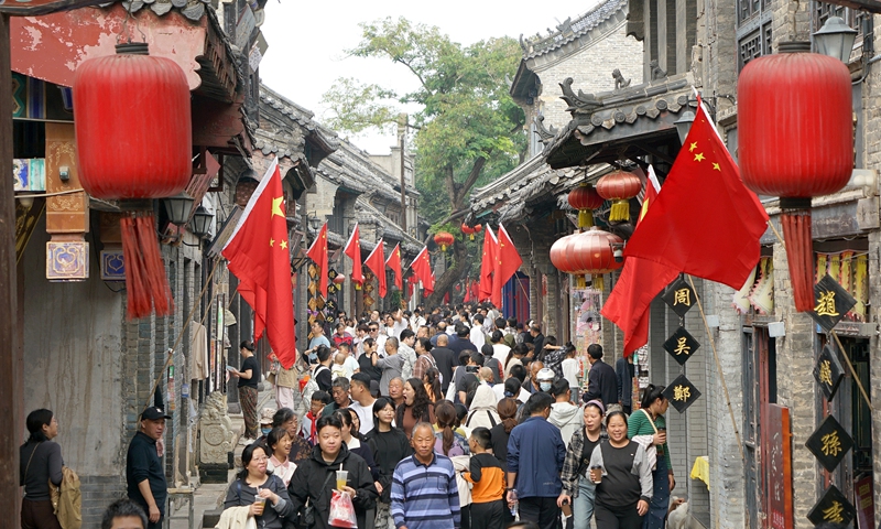 Tourists seen in Zhoucun Old County in Zibo, East China's Shandong Province on October 7, 2025. Photo: VCG