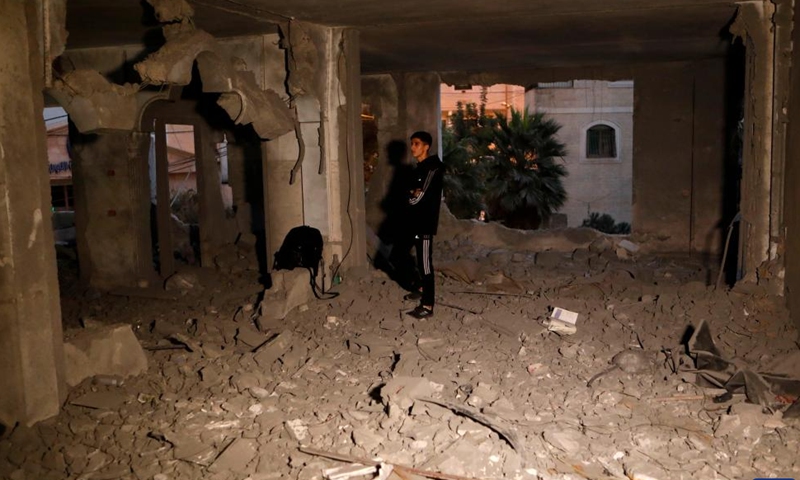 A Palestinian inspects the ruins of a house demolished by Israeli army forces in the West Bank city of Hebron, Oct. 6, 2025. (Photo by Mamoun Wazwaz/Xinhua)