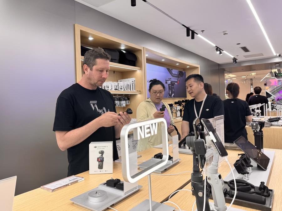 Sebastian Goyon visits a DJI store at APM Mall in Beijing, capital of China, July 2, 2025. (Photo: Xinhua)