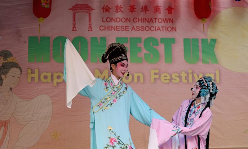 Artists perform at a show for the celebration of the Chinese Mid-Autumn Festival in London, Britain, Oct. 5, 2025. A show for the celebration of the Chinese Mid-Autumn Festival was staged in London Chinatown on Sunday afternoon, impressing many with performances featuring Chinese culture and art. (Xinhua/Li Ying)