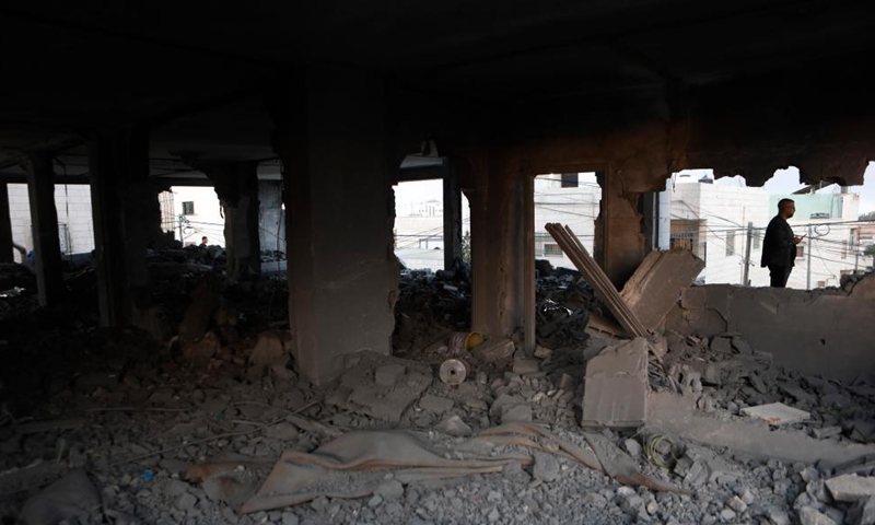 Palestinians inspect the ruins of a house demolished by Israeli army forces in the West Bank city of Hebron, Oct. 6, 2025. (Photo by Mamoun Wazwaz/Xinhua)