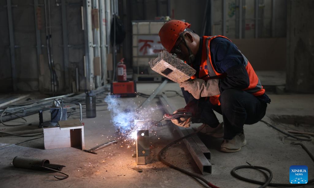 A worker works at a construction site of the Central Business District (CBD) project in the new administrative capital on the outskirts of Cairo, Egypt, on Oct. 5, 2025. (Photo by Li Binghong/Xinhua)
