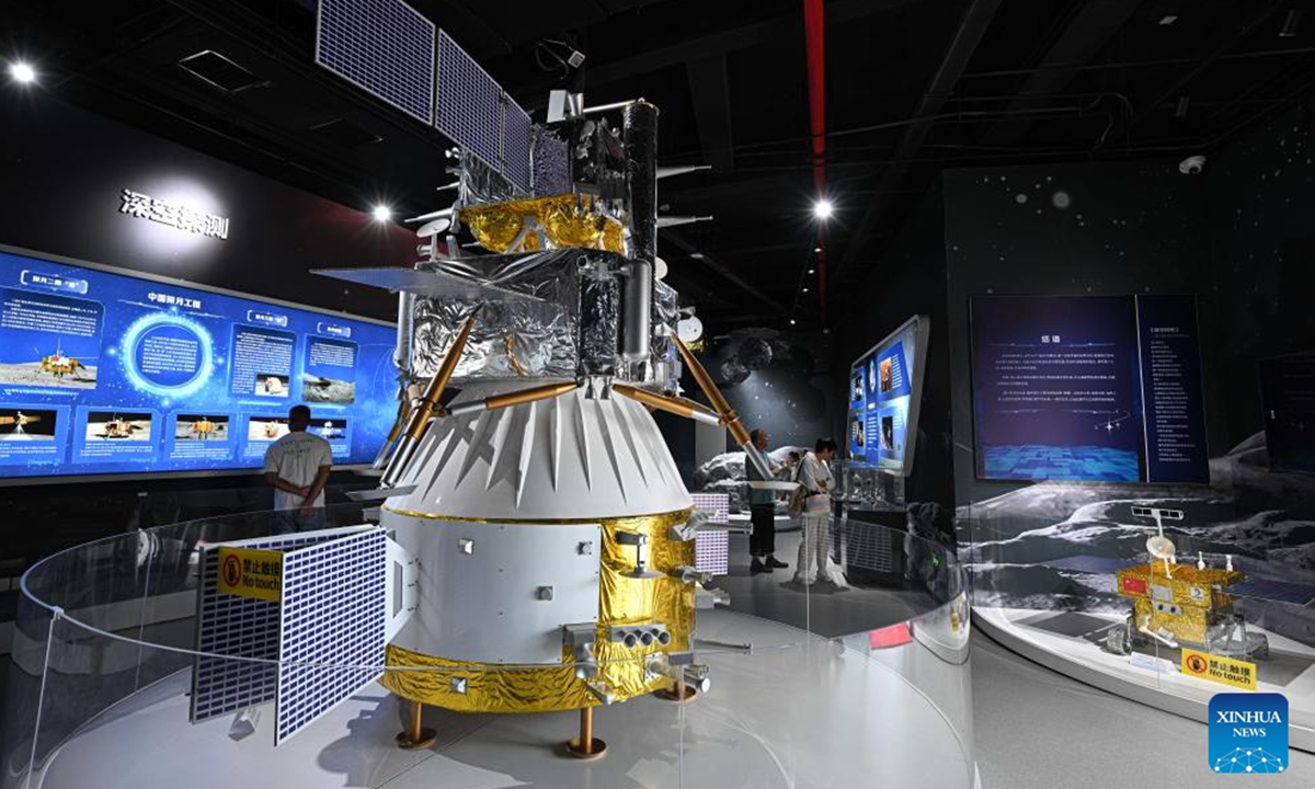 This photo taken on Oct. 7, 2025 shows a model of China's Chang'e-6 lunar probe displayed at the Wenchang Aerospace Science and Education Center in Wenchang, south China's Hainan Province. The upgrade project of the Wenchang Aerospace Science and Education Center is nearing completion. In preparation for its official opening, the center is open to the public free of charge for a limited time, allowing visitors to experience its operation and services firsthand. Following the renovation, the exhibition now features immersive experiences in aerospace history, rocket launches, space science and future exploration. (Xinhua/Pu Xiaoxu)