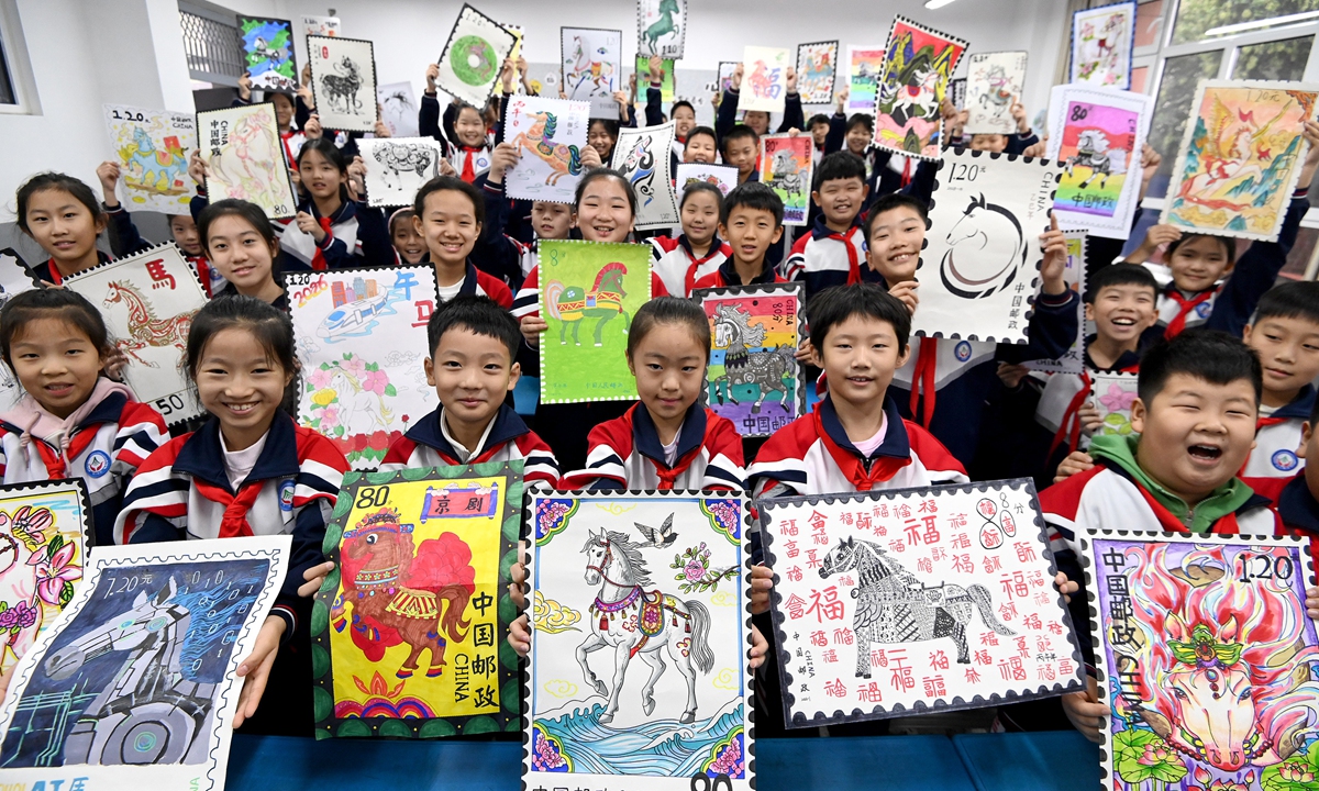 Students at a primary school in Handan, North China's Hebei Province, display their hand-drawn Year of the Horse zodiac stamps on October 9, 2025, which is also World Post Day. The Year of the Horse will begin in February 2026, according to the Chinese zodiac calendar. Photo: VCG