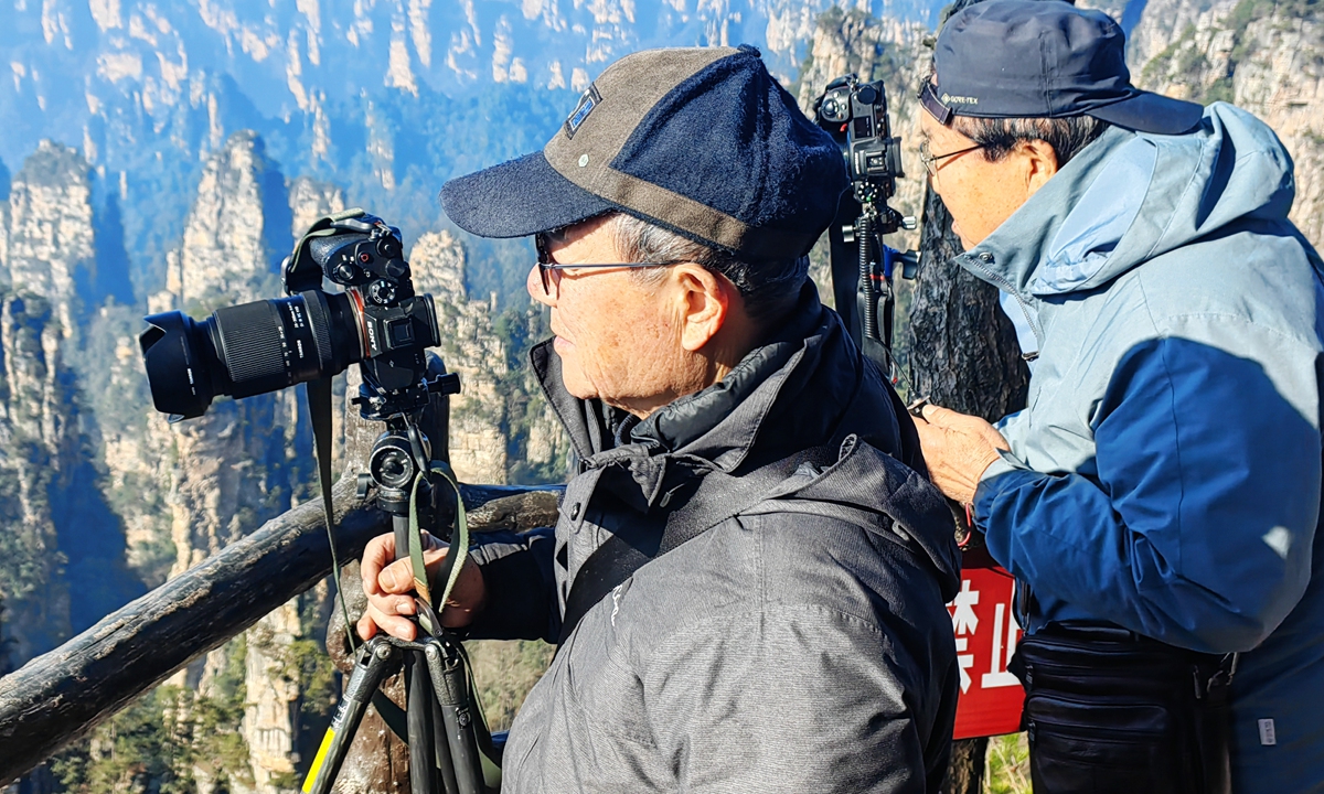 Zhangjiajie National Forest Park in Zhangjiajie, Central China's Hunan Province welcomes a group of South Korean photographers on January 5, 2025. Photo: VCG