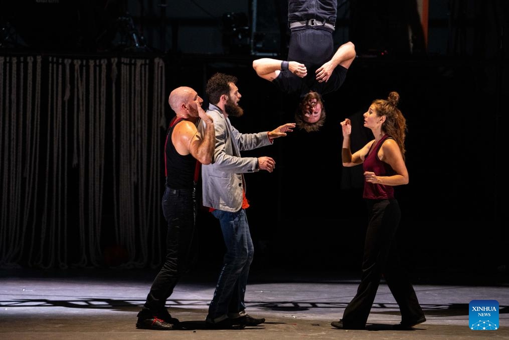 Acrobats perform during the 2025 Zhangjiajie International New Acrobatic Theater Festival in Yongding District of Zhangjiajie, central China's Hunan Province, Oct. 11, 2025. The event kicked off in Zhangjiajie on Saturday, with the participation of acrobats from more than ten countries and regions including France, Russia, Germany, Italy, and Chile. Over 60 shows will be presented during the five-day event, integrating elements of drama, dance, music, and new media. (Photo: Xinhua)