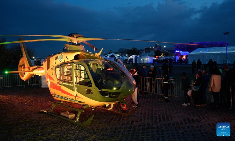 People view a Polish air ambulance helicopter during an aviation night event in Warsaw, Poland, Oct. 10, 2025. (Photo: Xinhua)