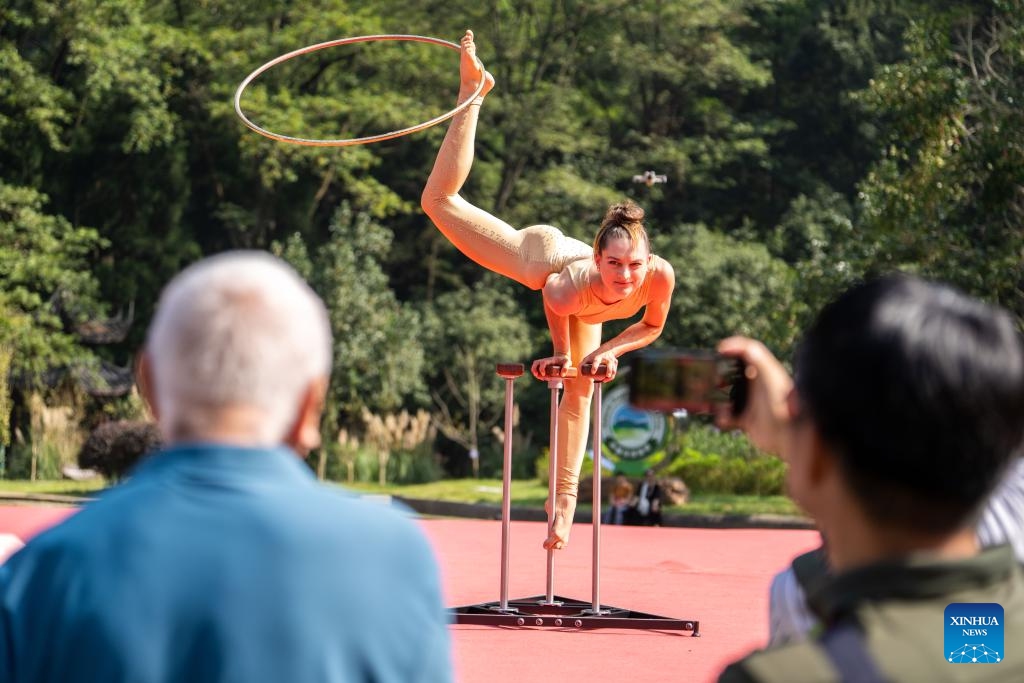 An acrobat from Germany performs during the 2025 Zhangjiajie International New Acrobatic Theater Festival at the Zhangjiajie National Forest Park in Zhangjiajie, central China's Hunan Province, Oct. 11, 2025. The event kicked off in Zhangjiajie on Saturday, with the participation of acrobats from more than ten countries and regions including France, Russia, Germany, Italy, and Chile. Over 60 shows will be presented during the five-day event, integrating elements of drama, dance, music, and new media. (Photo: Xinhua)