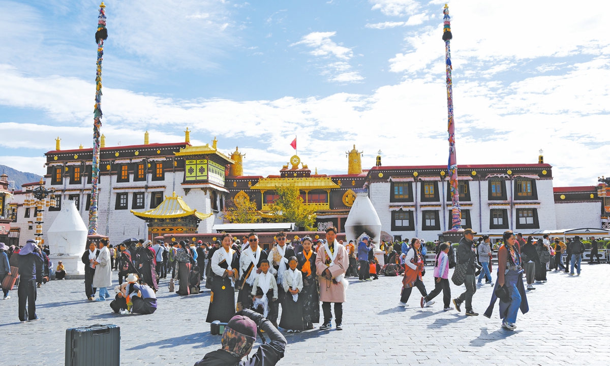 Tourists visit the Jokhang Temple Square in Lhasa, Tibet, on October 2, 2025. Photo: VCG