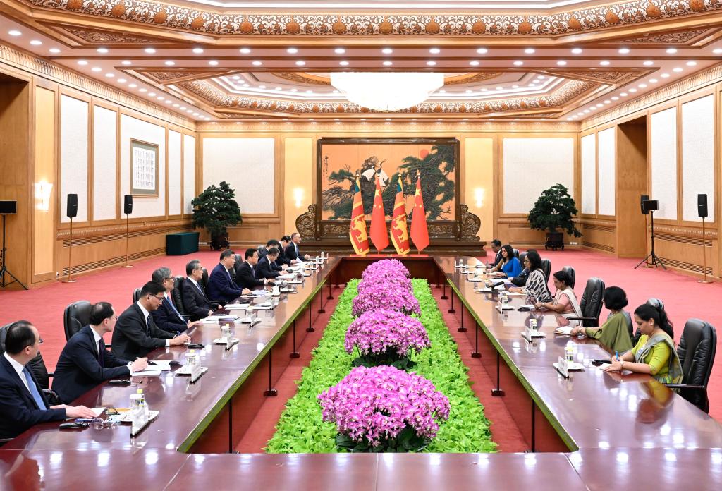 Chinese President Xi Jinping meets with Sri Lankan Prime Minister Harini Amarasuriya, who is in Beijing for the Global Leaders' Meeting on Women, at the Great Hall of the People in Beijing, capital of China, Oct. 14, 2025. (Xinhua/Shen Hong)