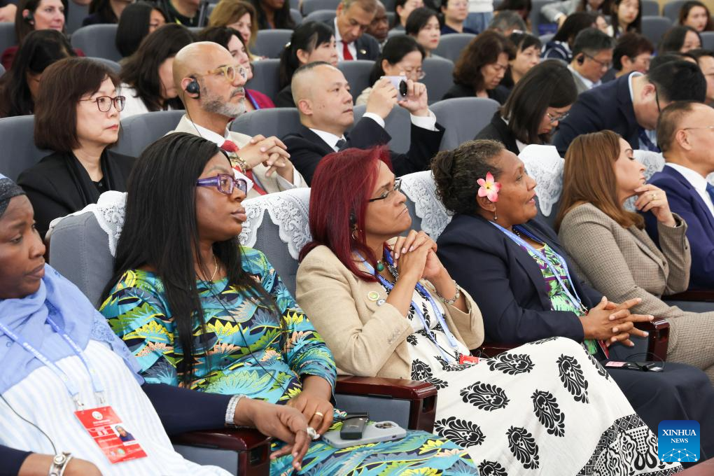 Attendees are pictured during the unveiling ceremony of Global Center for Women's Capacity Building in Beijing, capital of China, Oct. 14, 2025. The ceremony was held by the All-China Women's Federation and the China International Development Cooperation Agency on Tuesday. (Xinhua/Liang Xu)