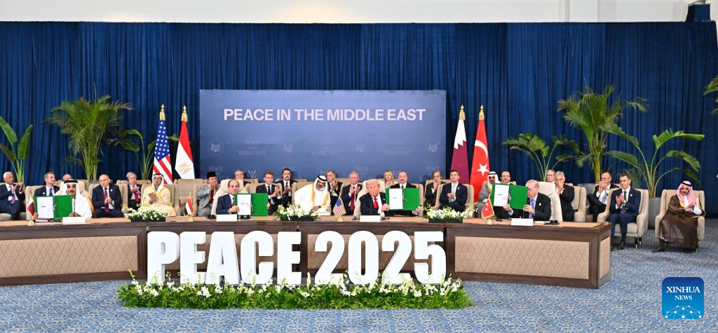 Egyptian President Abdel Fattah al-Sisi (2nd L, front), U.S. President Donald Trump (2nd R, front), Turkish President Recep Tayyip Erdogan (1st R, front), and the Emir of Qatar, Sheikh Tamim bin Hamad Al Thani (1st L, front) display the signed document to support Gaza ceasefire deal during a summit on Gaza ceasefire held in Sharm el-Sheikh, Egypt, Oct. 13, 2025. A document to support the recently-reached Gaza ceasefire deal was signed here Monday by the deal's four mediators, though without the attendance of either Israel or Hamas. (Egyptian Presidency/Handout via Xinhua)