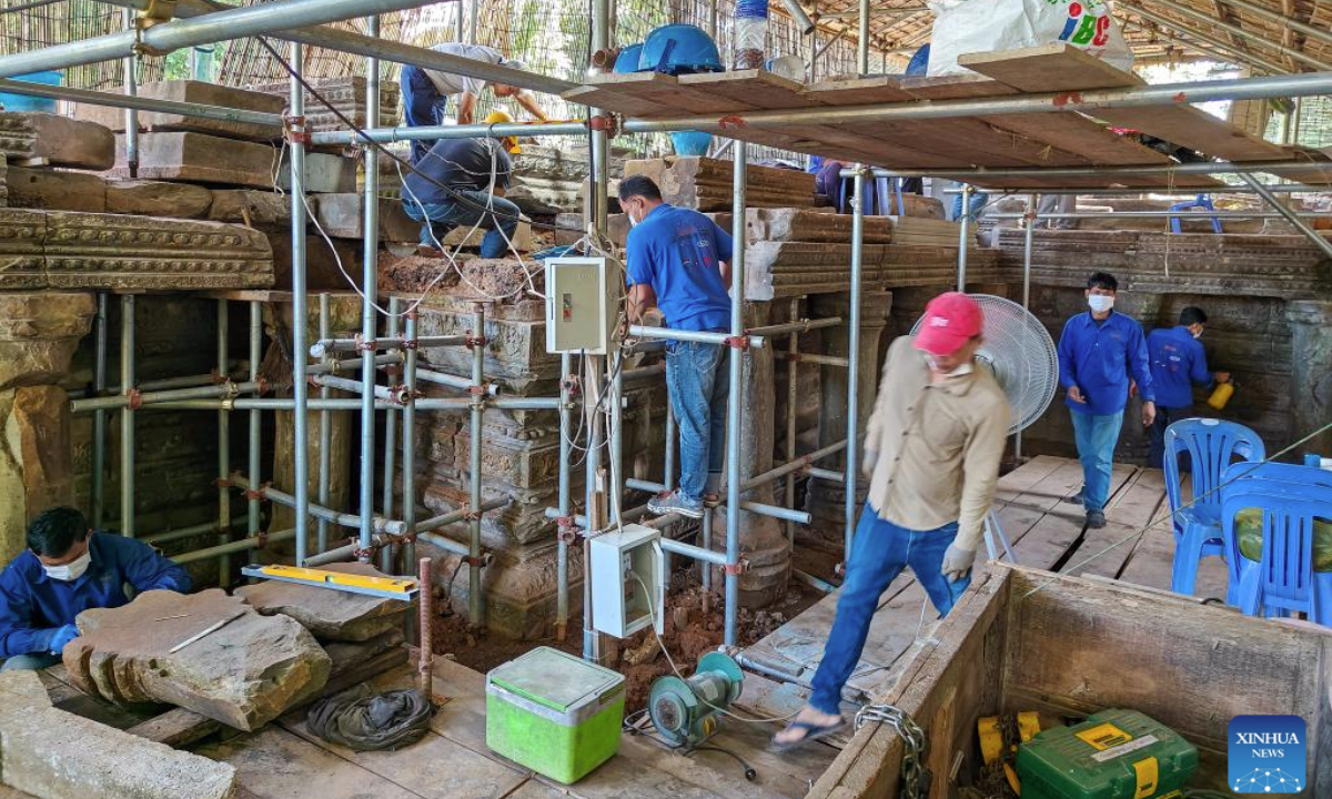 Staff members work at the restoration site of the front terrace of the Banteay Samre Temple in Siem Reap province, Cambodia on Oct. 17, 2025. Archaeologists have been restoring the ruined front terrace of the Banteay Samre Temple in Cambodia's Angkor Archaeological Park, the APSARA National Authority (ANA) said in a news release on Tuesday. (ANA/Handout via Xinhua)