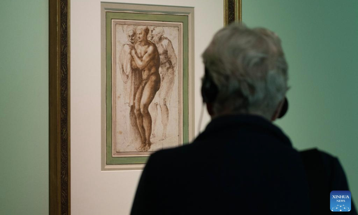 A visitor views a drawing by Michelangelo during the media preview of the exhibition Michelangelo's Men at the Teylers Museum in Haarlem, the Netherlands, Oct. 13, 2025. The exhibition, which will be open to the public on Wednesday, showcases the works of Italian artist Michelangelo in celebration of his 550th birth anniversary. The exhibition will last until Jan. 25, 2026. (Photo by Sylvia Lederer/Xinhua)