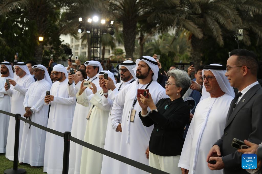 Chinese Consul General in Dubai Ou Boqian (3rd, R) witnesses the demo flight of a flying car developed by Chinese company XPENG AEROHT in Dubai, the United Arab Emirates, Oct. 12, 2025. A flying car developed by Chinese company XPENG AEROHT on Sunday took to the skies over Dubai, the United Arab Emirates (UAE), marking a significant step in the global reach of China's low-altitude aircraft technology. (Photo: Xinhua)