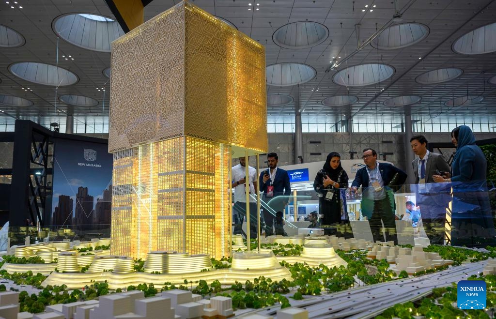 People visit the 13th edition of Cityscape Real Estate Exhibition at Doha Exhibition and Convention Center in Doha, Qatar, Oct. 12, 2025. Running from Oct. 12 to 14, the exhibition showcases groundbreaking projects and offers attendees the chance to engage with top developers. (Photo: Xinhua)