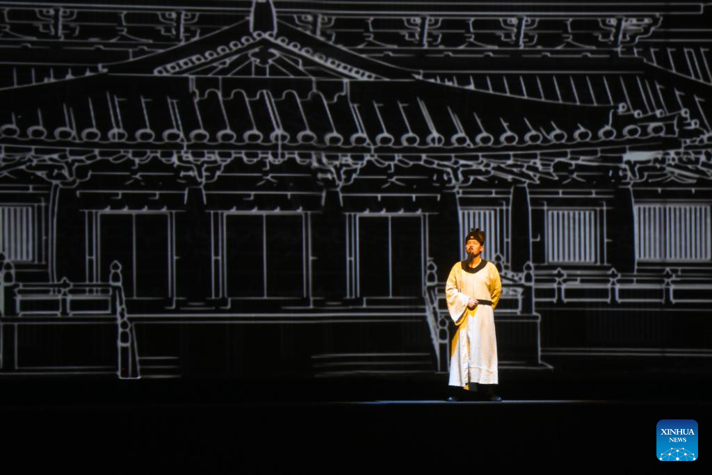 An actor performs during the immersive drama Encore Dunhuang in Dunhuang, northwest China's Gansu Province, Oct. 15, 2025. The immersive drama Encore Dunhuang showcases Dunhuang's history, costumes, and music and dance culture. The drama have been performed over 1,000 times this year, attracting over 500,000 viewers. (Xinhua/Fan Peishen)