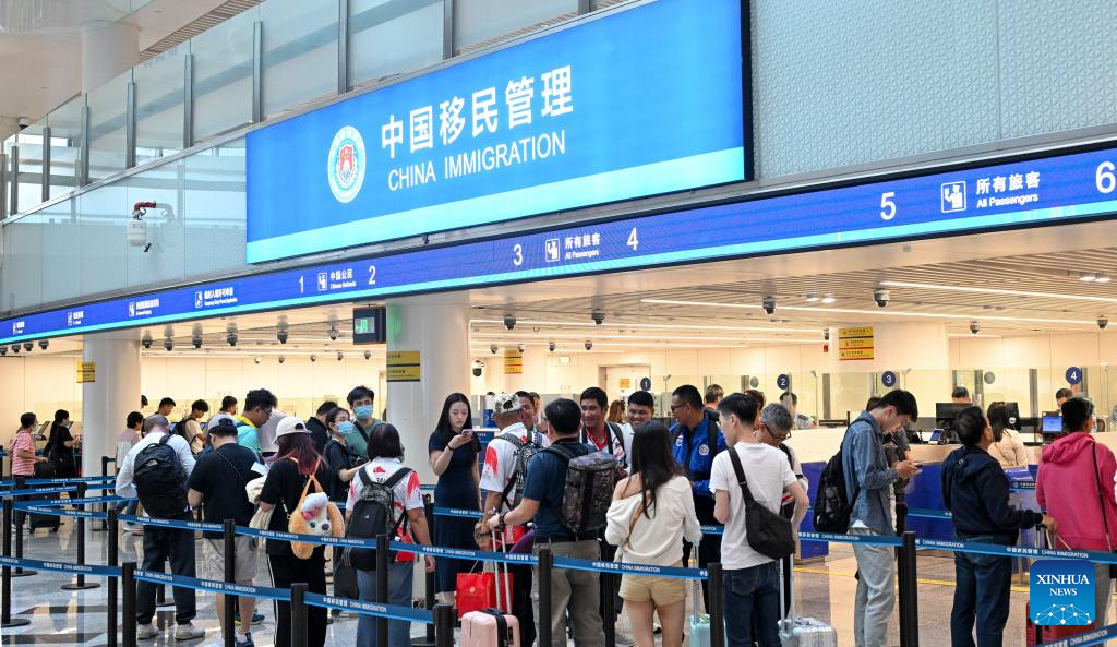 Inbound passengers line up to go through border inspection procedures at Haikou Meilan International Airport in Haikou, south China's Hainan Province, Oct. 15, 2025. Hainan has handled 2 million inbound and outbound trips crossing the border this year as of Oct. 15, with foreign travelers accounting for 53 percent of the total, according to the Haikou General Station of Immigration Inspection.

Hainan has long enjoyed favorable visa-free entry policies in China. The majority of foreigners who enter Hainan do so under the visa-free entry policy. (Xinhua/Yang Guanyu)