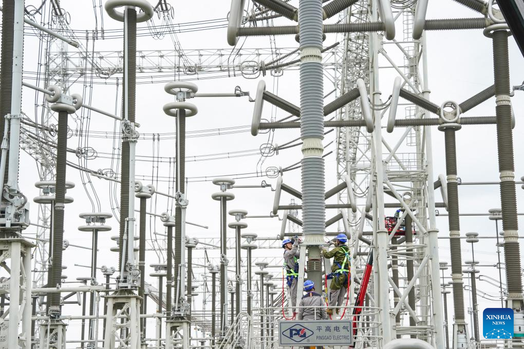 Staff members conduct maintenance work at the Guquan converter station in Xuancheng, east China's Anhui Province, Oct. 20, 2025. The Guquan converter station on the Changji-Guquan ultra-high voltage direct current (UHVDC) transmission line that transmits electricity from Xinjiang to east China is undergoing a 7-day annual overhaul started from Oct. 17.

The Changji-Guquan transmission line, which was put into operation in September 2019, leads the world in terms of voltage level, transmission capacity and distance. (Xinhua/Du Yu)