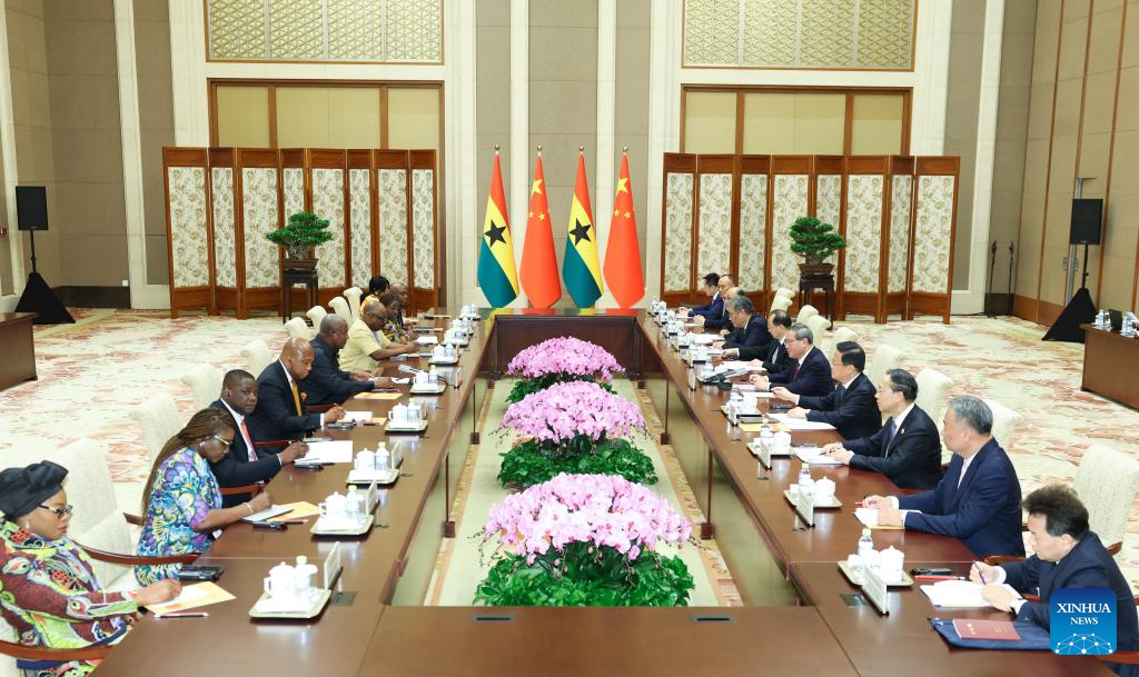 Chinese Premier Li Qiang meets with Ghanaian President John Dramani Mahama, who is here for the Global Leaders' Meeting on Women, at the Diaoyutai State Guesthouse in Beijing, capital of China, Oct. 13, 2025. (Xinhua/Huang Jingwen)