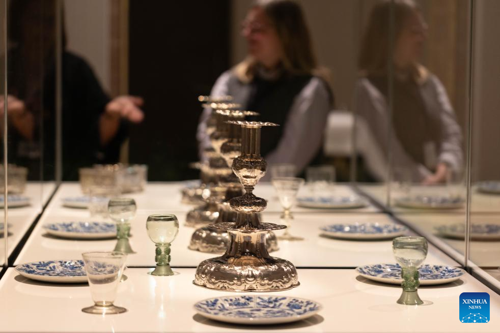 Visitors view exhibits during the media preview of the exhibition At Home in the 17th Century at the Rijksmuseum in Amsterdam, the Netherlands, Oct. 14, 2025. The exhibition, which showcases the lives of people in the Netherlands in the 17th century, will be open to the public from Oct. 17, 2025 to Jan. 11, 2026. (Photo by Sylvia Lederer/Xinhua)