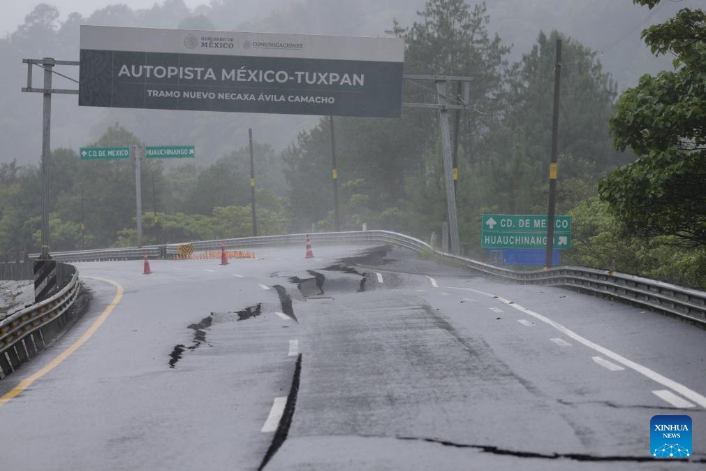 A section of highway damaged by rain is pictured in Huauchinango, Puebla state, Mexico, Oct. 11, 2025. At least 41 people have been killed as torrential rains and landslides battered Mexico in recent days. (Photo: Xinhua)